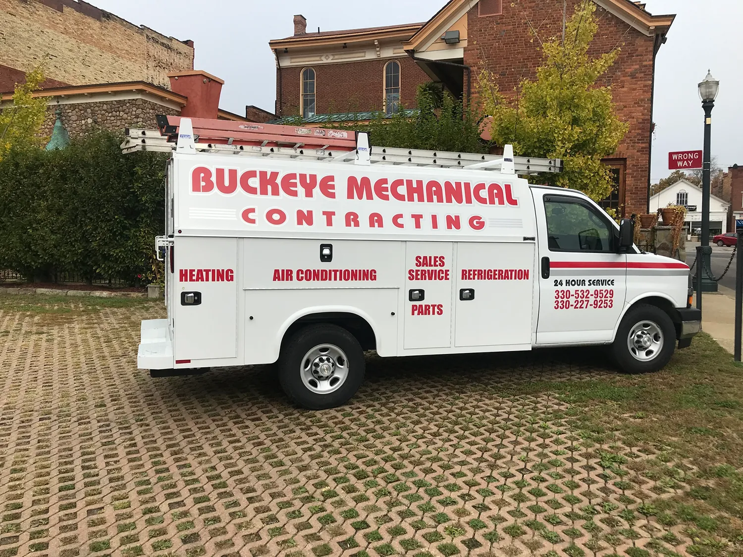 A Buckeye Mechanical & Contracting truck sits in a parking lot.